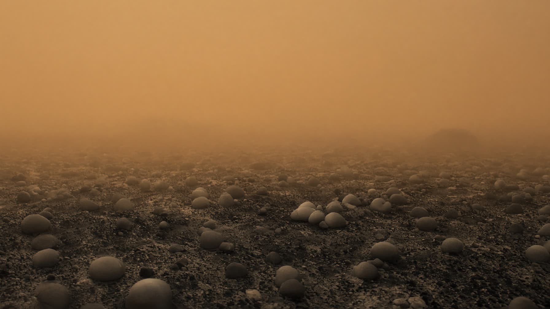 A dim orange-brown haze over rounded icy pebbles and dark ground, like the Huygens landing, no people.
